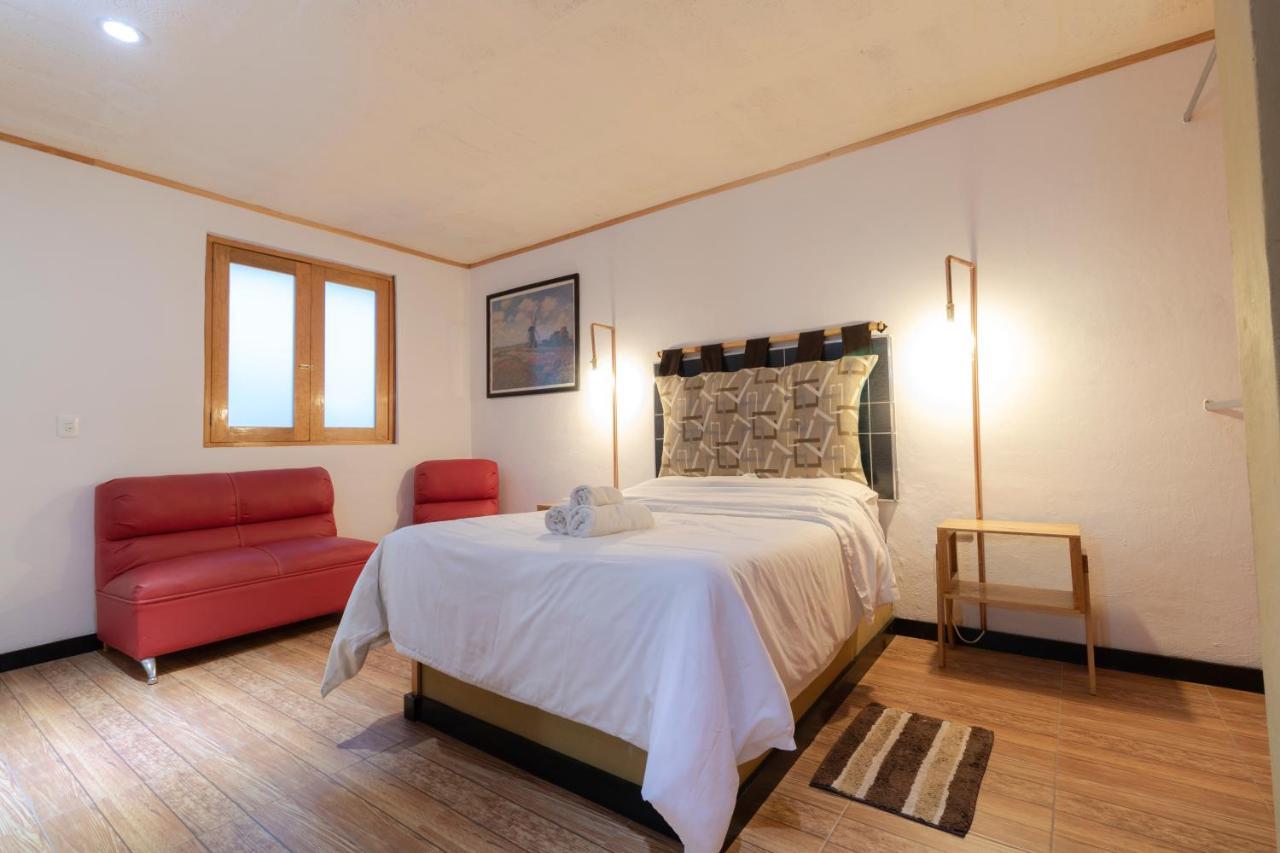 تشولولا Pascual Inn Suites المظهر الخارجي الصورة
