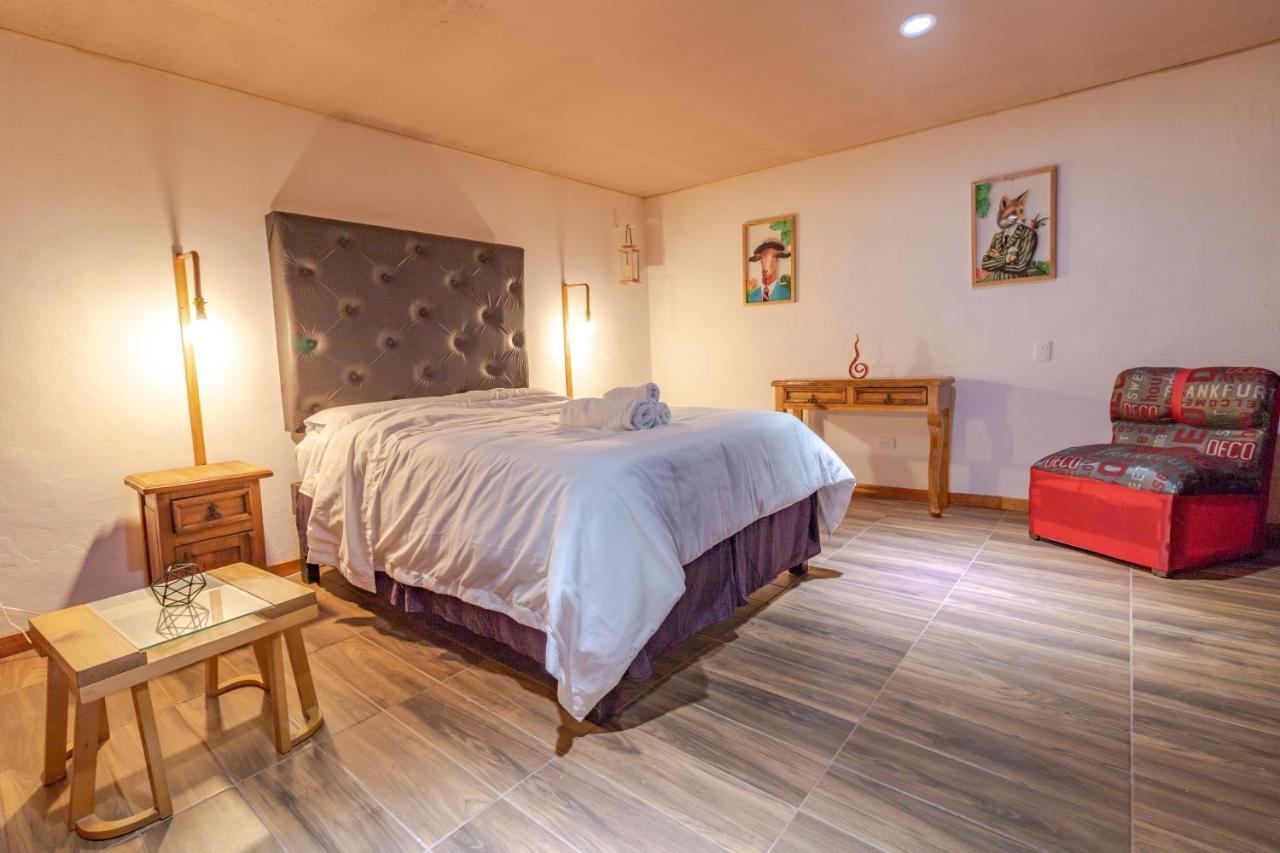 تشولولا Pascual Inn Suites المظهر الخارجي الصورة